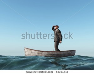 stock-photo-lost-man-in-a-boat-53351443