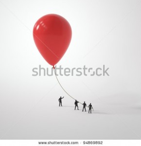 stock-photo-tiny-people-holding-a-balloon-94869892